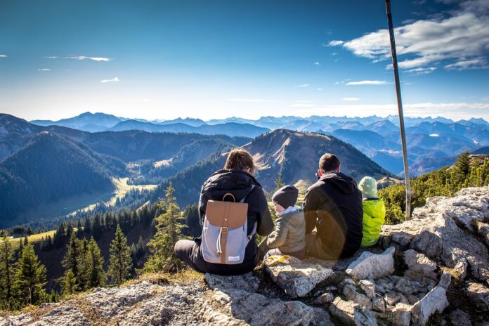 a-family-at-the-summit-of-a-mountain