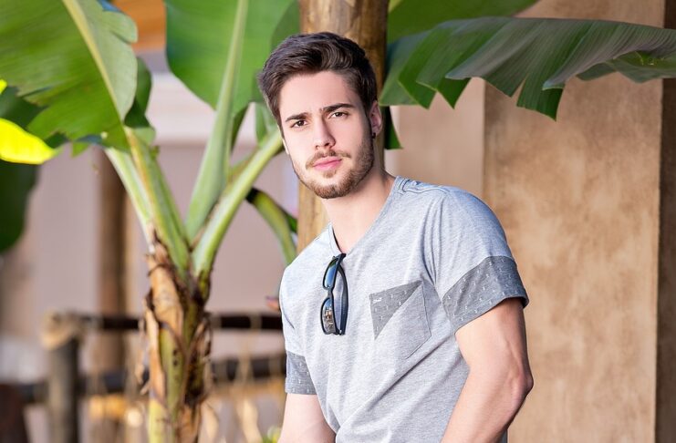 sitting-man-on-a-barrier