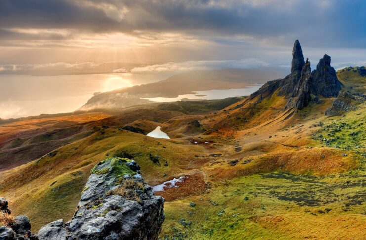 mountain-sky-and-green-landscape-with-rocks